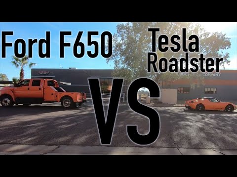 Tesla vs Ford: Roadster and F650 Truck Tow Pull Challenge!