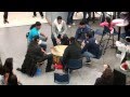 The Montana State University Bobcat Singers drum group performs in Renne Library on April 11, 2013. Featured singers include: ...