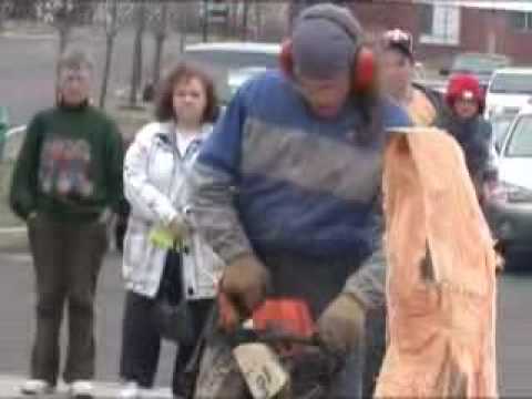 Chainsaw wood carving - Santa Clause start to fini...