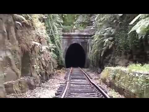 Here is a look at the old disused railway tunnel, and what's left of the station at Helensburgh, New South Wales, Australia. Having a bit of fun with the eeriness of the tunnel that use to carry the rail line to down the South Coast to Illawarra. Some of the famous people to travel on it include authors, DHLawrence and Robert Louis Stevenson... if only the tunnel walls could speak..... but who knows what may happen sometimes if your imagination takes over..... And have a look at GHOST TUNNEL - GLOW WORM CITY where three locals go to explore for the glow worm in this same tunnel.