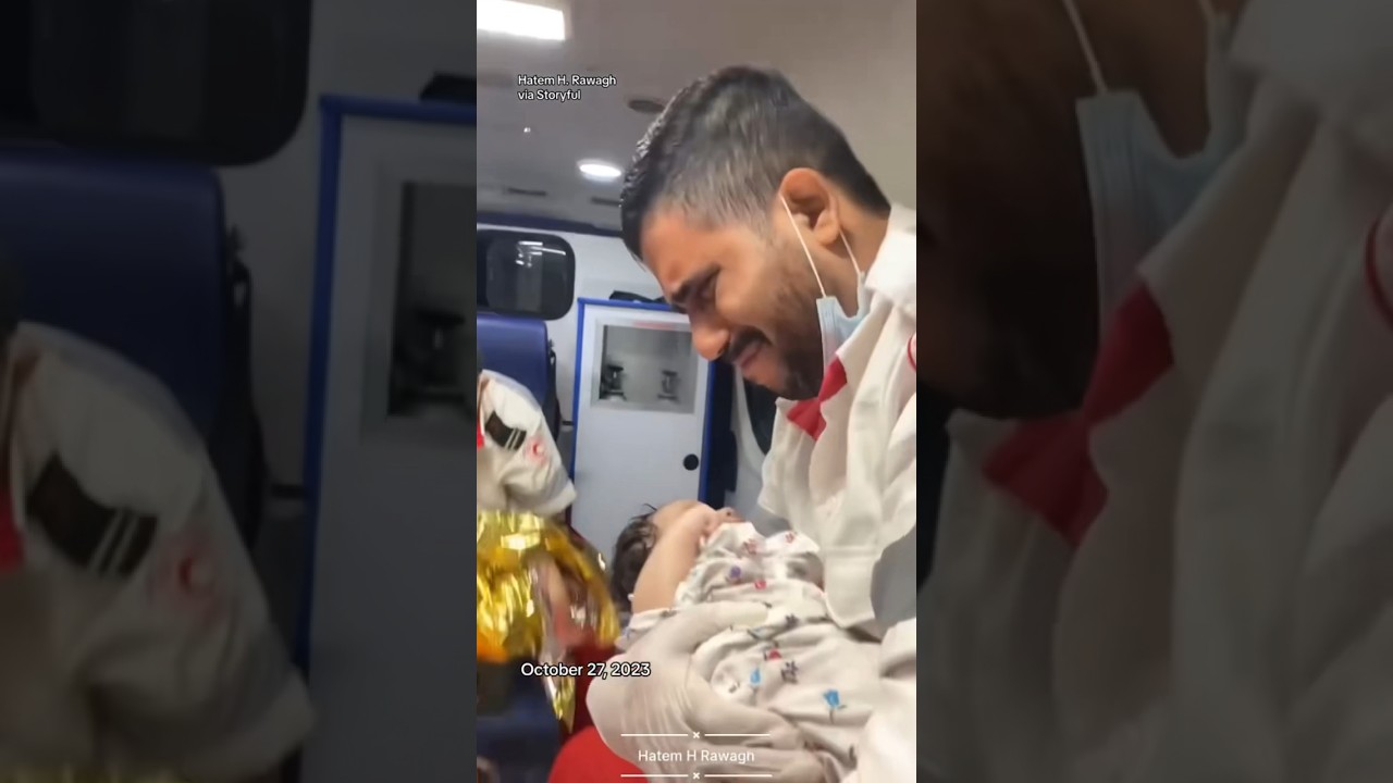 ⁣Gaza emergency worker breaks down in tears while cradling baby #shorts