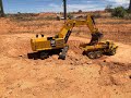 LARGE 1/14 scale RC CAT 6015B Excavator Mining in open cut pit.