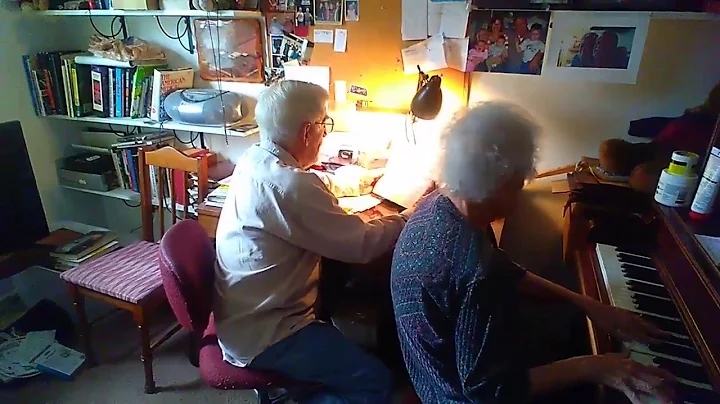 Elderly Couple Singing/Playing America