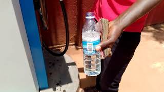 Buying Kerosene at Gas Station | Kampala City Walk
