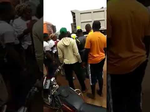 Vigilante assaulting Kogi State University Student, at the school campus gate