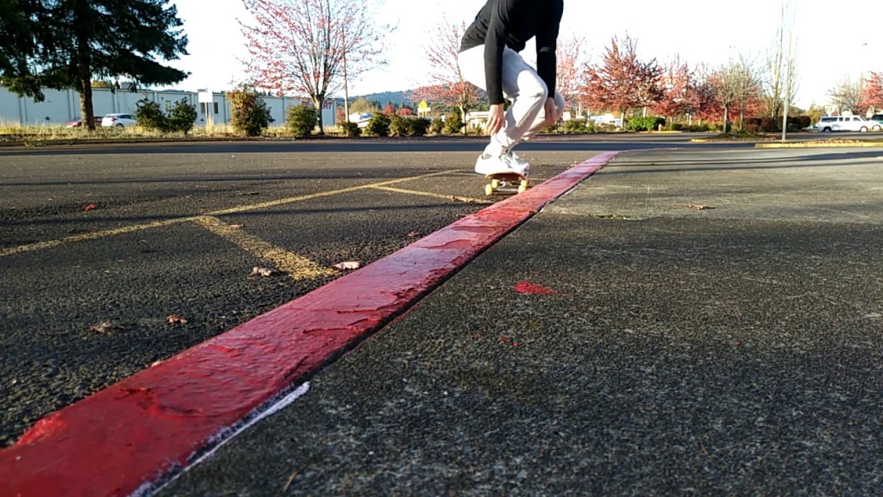 Practicing 50 50s on a red curb - YouTube