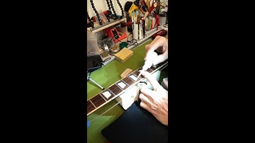 Regluing Fretboard Inlays