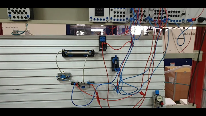 Automatic forward and reverse control of double acting cylinder with limit switch and capacitive sen