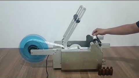 Máy dán nhãn chai tròn bán tự động