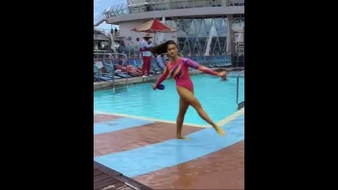 She is swimming at the pool