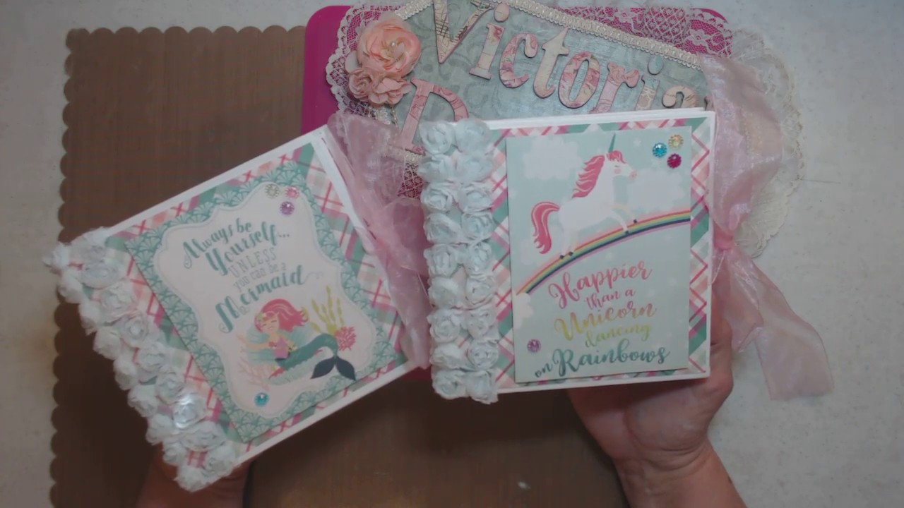 6x6 Mini  Album I made  using Echo Park , Imagine That paper