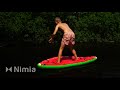 boy balancing on air mattress