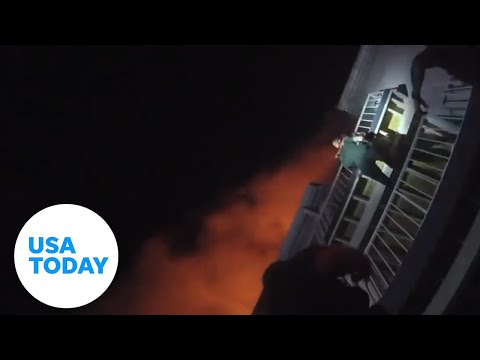 Florida deputy scales burning building to save baby girl | USA TODAY