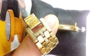إذا وجدت هذا الختم والكتابة فتأكد أنك تملك ساعة أو حزام من الذهب الصافي
