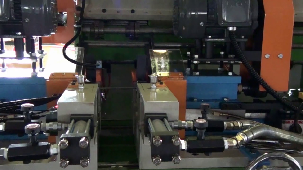 Auto feeding double end chamfering machine