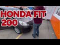 Установка подлокотника HONDA FIT GE6 GE7 2007-2013 в штатные подстаканники.