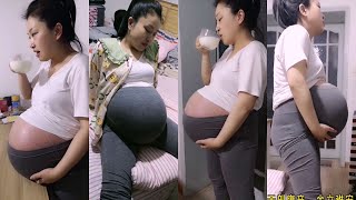 giant pregnant  belly |  pregnant mummy  with twins have difficulty getting up