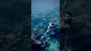 Graceful Depths, Fearless Beauty In Motion.