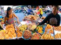 Cambodian street food at boeung prolit local market  delicious hotdog donuts fresh foods  more