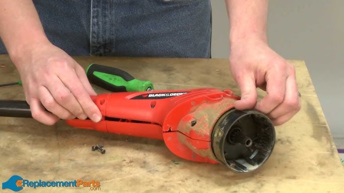 How to Replace the Guard Assembly on a Black and Decker CST1200 String  Trimmer (Part # 598911-02) 
