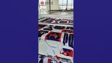 Laser contour cutting sublimated jerseys fabric #lasercutting #goldenlaser