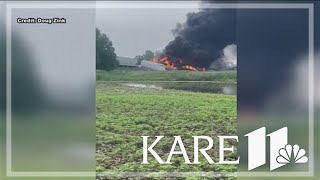 Rail cars carrying hazardous material derail and catch fire in North Dakota