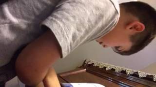 Elijah playing piano