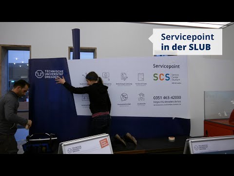 Beklebung des SCS Servicepoints in der SLUB