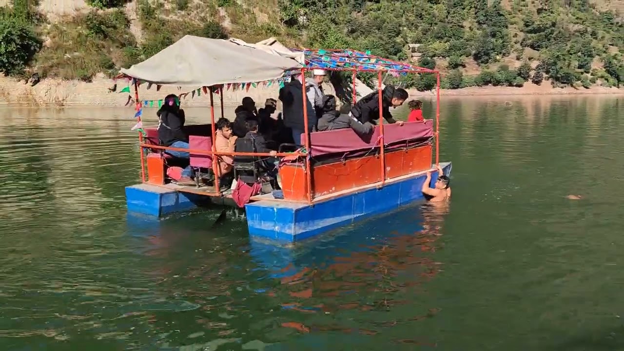 Boating in beautiful Syarpu Lake, Western Rukum