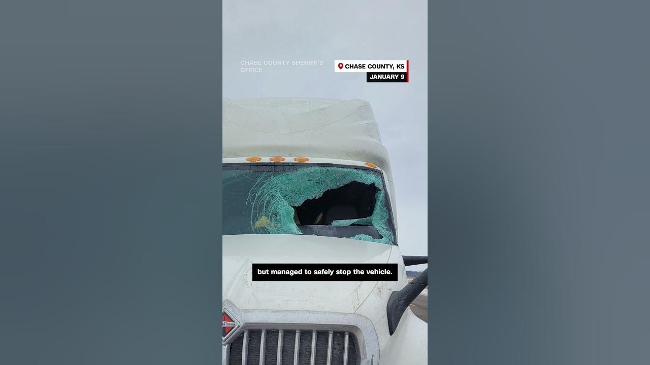 Ice flies off a moving car and smashes into a passing truck’s windshield