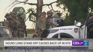 Woman hugs negotiator after surrendering, ending 5-hour-long standoff on North Freeway Profile