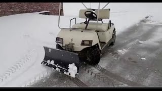 Golf Cart Plowing Snow