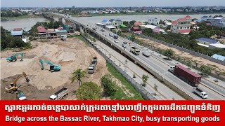 Bridge across the Bassac River, Takhmao City, busy transporting goods