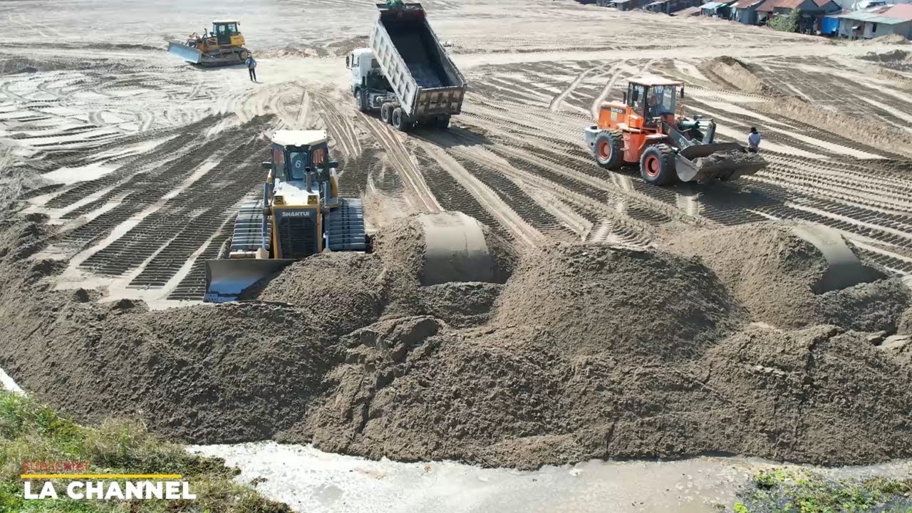 Sand Filling Up Good Skill Operator Bulldozer Push Clear Sand To Big sand-filling-up-good-skill-operator-bulldozer-push-clear-sand-to-big