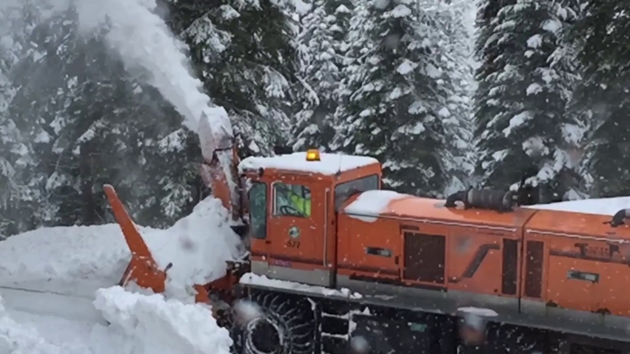 Massive snow blower destroys snowbanks in Lake Tahoe CA YouTube