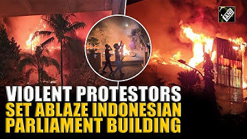 Three dead as Indonesian protesters set fire to regional parliament building