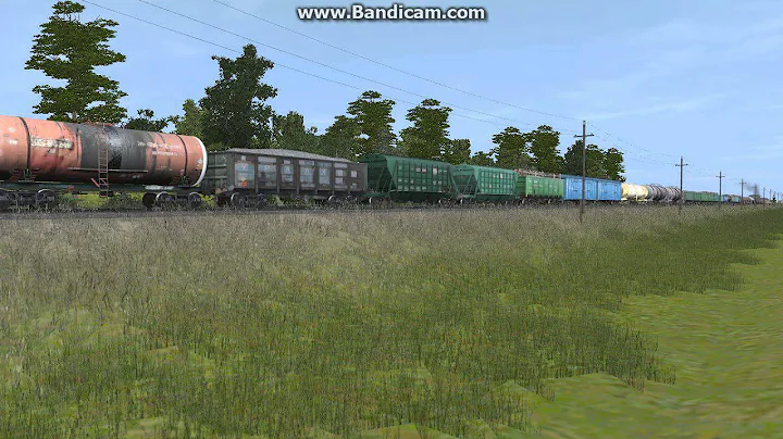 тепловоз 3ТЭ116У-0001 с грузовым поездом