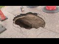 Woman says city didn't do enough to keep her from driving into massive pothole in northeast Houston