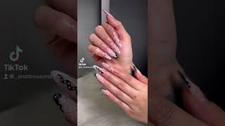 Medium acrylic almond nails with nail art design.