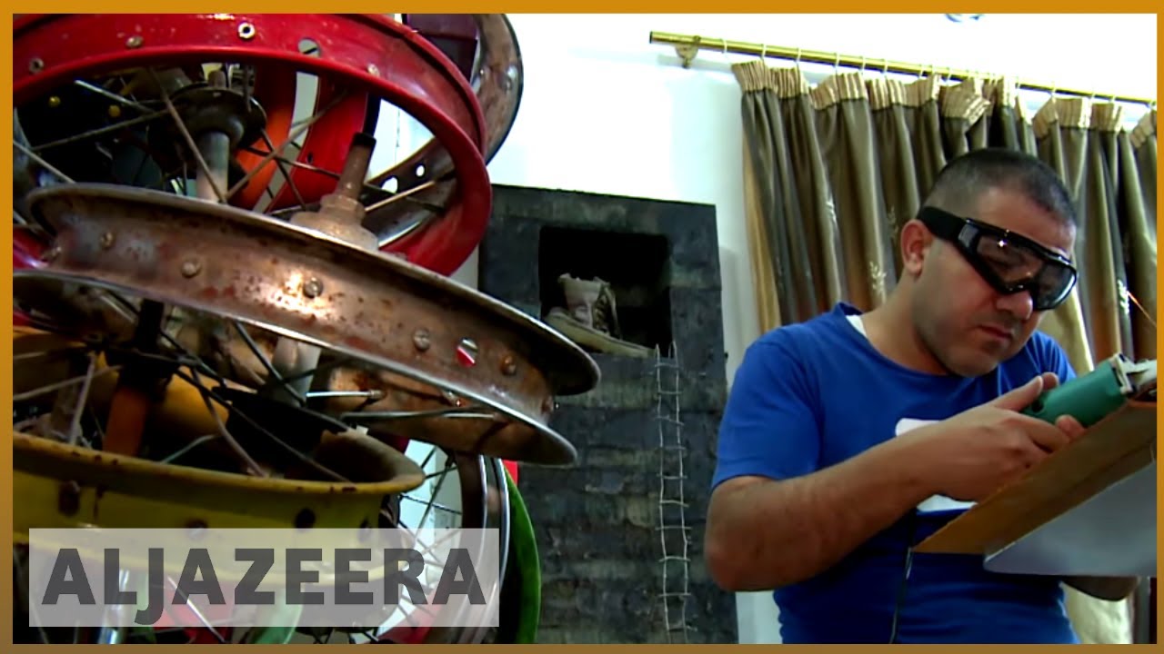 🎨🇮🇶 كيف يستخدم العراقيون الفن للتعبير عن الحق في وجه السلطة | الجزيرة الإنجليزية