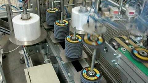 Flap disc labelling and packaging machine