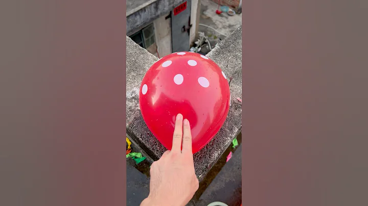 Experiment: Will a water balloon explode when it rolls down from a tall building? 💥🎈 #satisfying