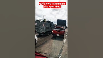 Xe xếp hàng dày đặc trên Quốc lộ 60 trước chân cầu Rạch Miễu hướng đi Tiền Giang.