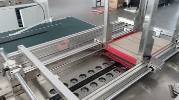 Book box assembly machine with hot glue spraying gun