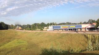 CSX ES44AH #3128 leads loaded SB autorack