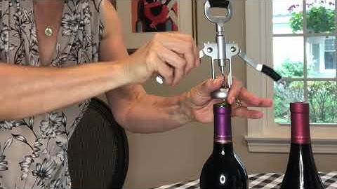 USING A WINGED CORKSCREW