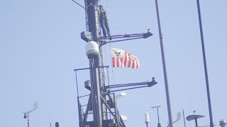 Coast Guard WWII veteran gifts Coast Guard with historical flag