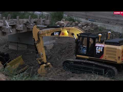 YouTube thumbnail: RC hydraulic excavator, RC Dozer and trackloader at work on site !