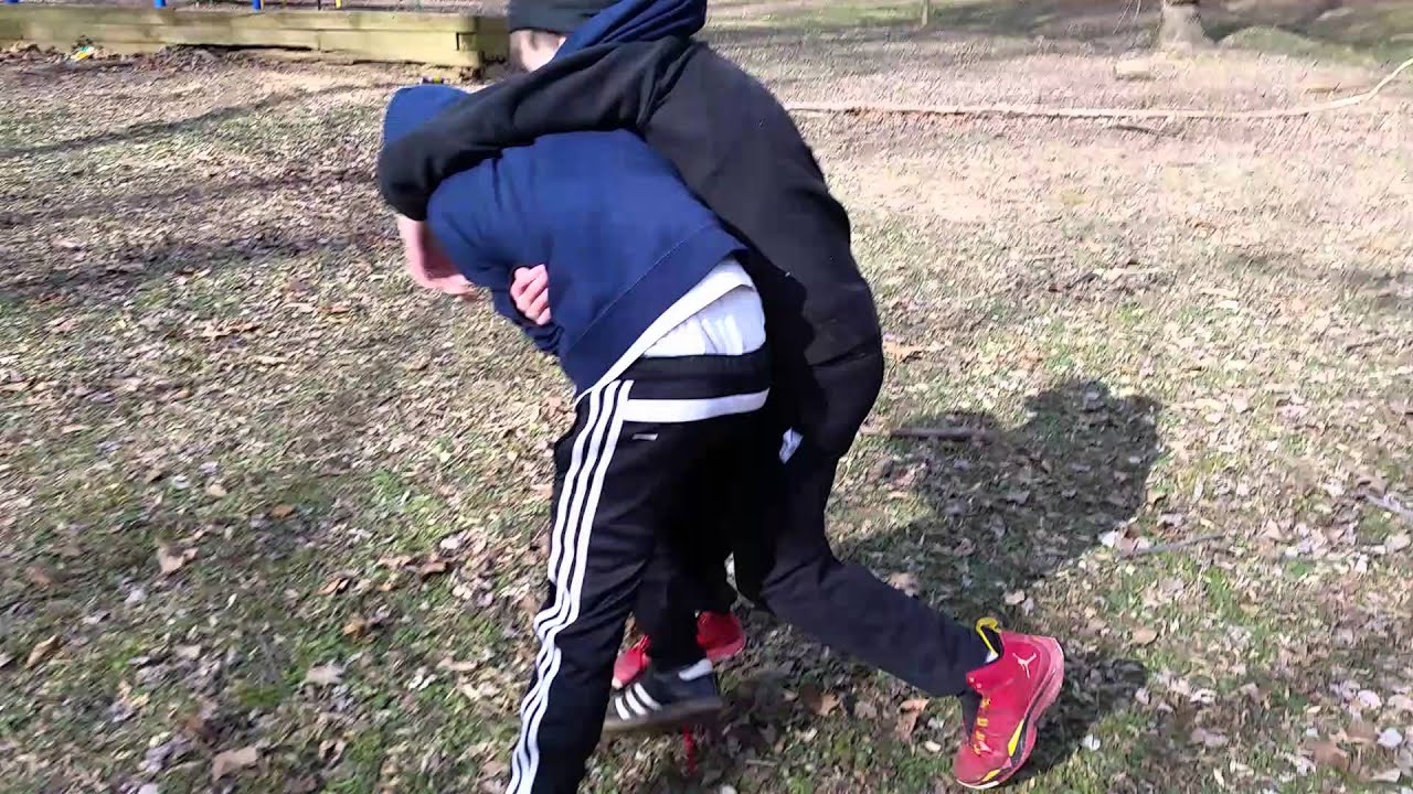 KID PULLS KNIFE ON OTHER KID DURING FIGHT 