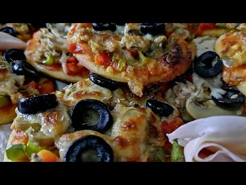 Video: Mini Pizzas Con Champiñones Y Aceitunas